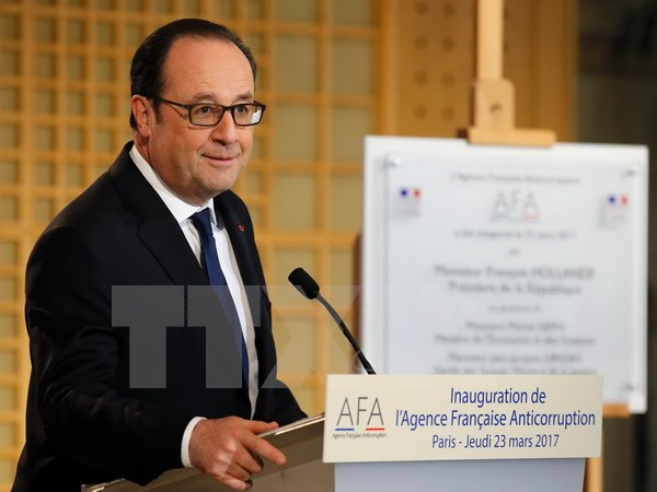 法国总统奥朗德访问新加坡等东南亚三国 ảnh 1