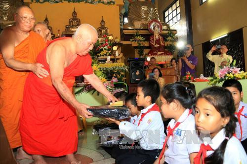 旅居老挝越南人举行活动纪念各位在老越南长老 ảnh 2