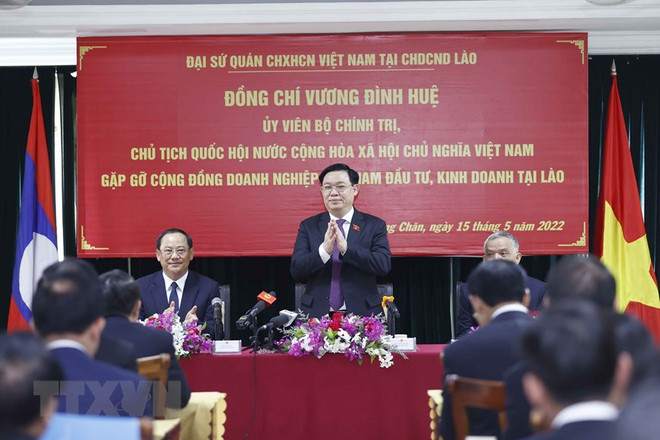 越南国会主席王廷惠与在老越南企业会面交流 ảnh 1 越南国会主席王廷惠与在老越南企业会面交流 ảnh 1