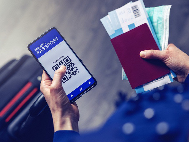 外交部例行记者会：20个国家承认越南疫苗护照 ảnh 1