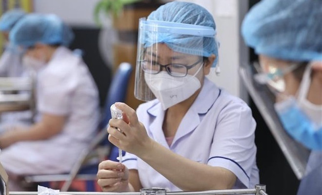 越南第十五届国会第二次会议:越南卫生部部长阮青龙:迅速扩大疫苗接种覆盖率 ảnh 2 越南第十五届国会第二次会议:越南卫生部部长阮青龙:迅速扩大疫苗接种覆盖率 ảnh 2