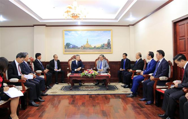 越南驻老挝大使馆庆祝老挝国庆44周年 ảnh 1 越南驻老挝大使馆庆祝老挝国庆44周年 ảnh 1