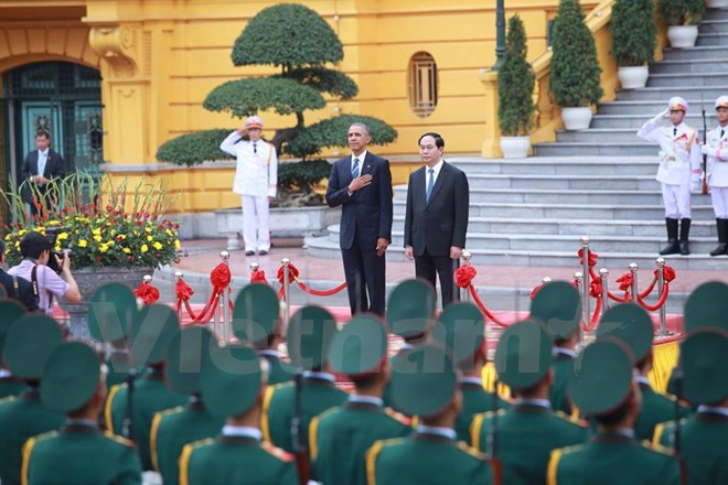 越南国家主席陈大光主持仪式欢迎美国总统奥巴马访越 ảnh 1