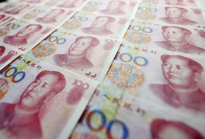 越南国家银行上调汇率 应对人民币贬值的权宜之计 ảnh 1 越南国家银行上调汇率 应对人民币贬值的权宜之计 ảnh 1