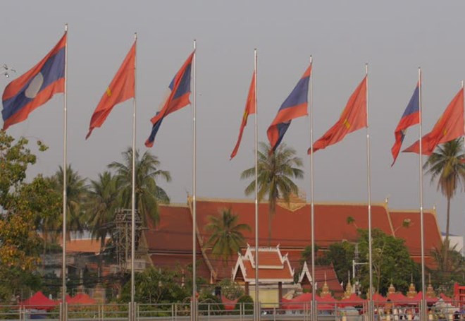 老挝担任2016年东盟轮值主席国一职后将着力维护东盟的团结 ảnh 1