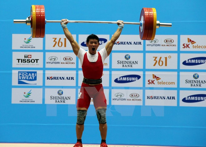 2015年全国举重锦标赛吸引124名运动员参赛 ảnh 1 2015年全国举重锦标赛吸引124名运动员参赛 ảnh 1