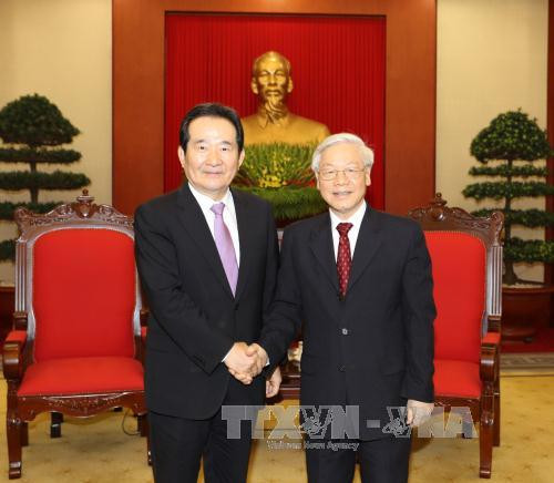 阮富仲总书记会见韩国国会议长丁世均 ảnh 1 阮富仲总书记会见韩国国会议长丁世均 ảnh 1