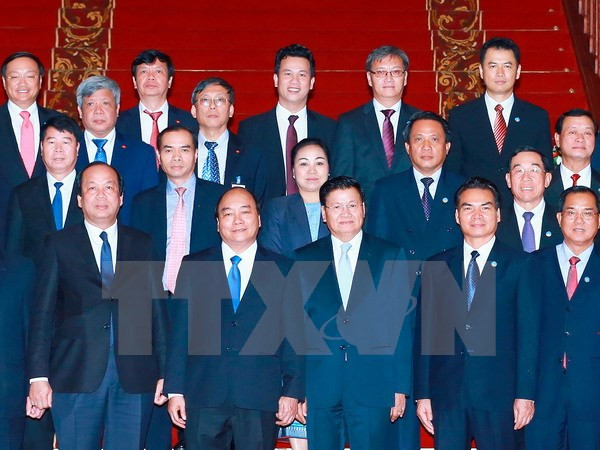 老挝媒体：阮春福访老之行为深化越老两国关系注入新动力 ảnh 1