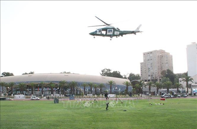 越南专业训犬队参加在阿尔及利亚举行的2021年国际军事比赛开幕式 ảnh 2