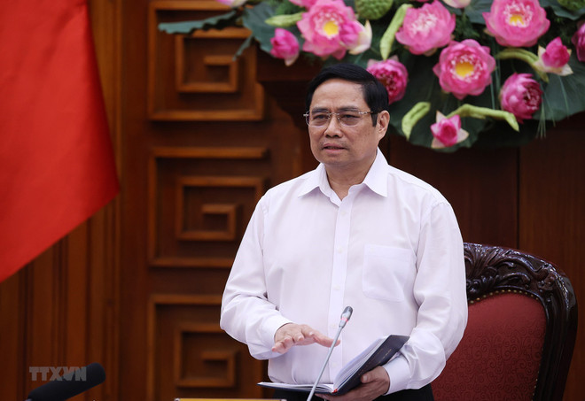 政府总理范明政担任国家新冠肺炎疫情防控指导委员会主任 ảnh 1