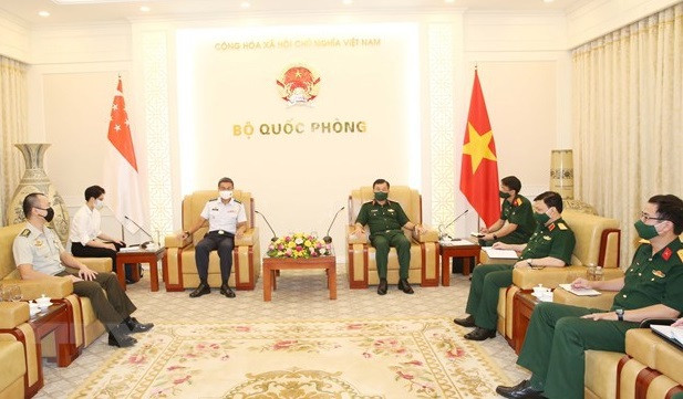越南国防部提议新加坡向越南转让新冠疫苗生产技术 ảnh 1