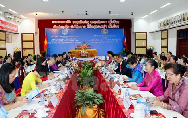 越老建交55周年：越老两国妇联加强合作 ảnh 1