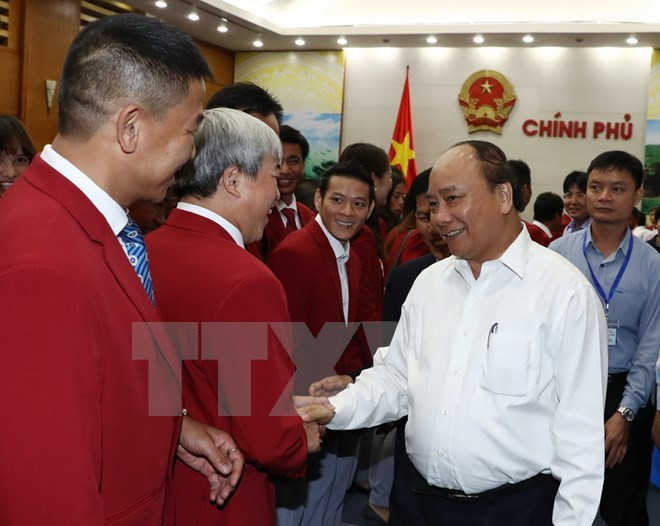 政府总理阮春福会见第29届东南亚运动会越南体育代表团各成员 ảnh 3
