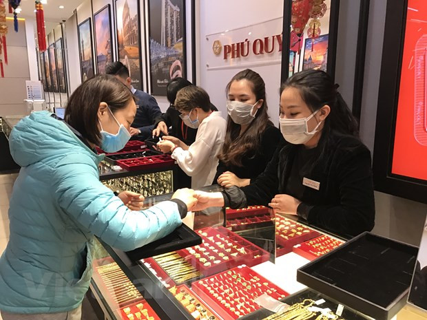 12月1日上午越南国内黄金价格继续下降25万越盾 ảnh 1