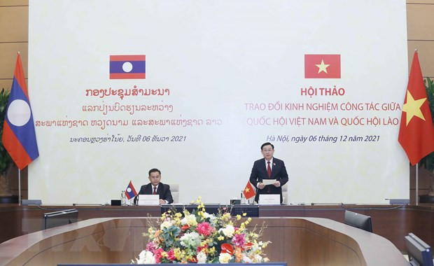 越南国会主席王廷惠与老挝国会主席赛宋蓬·丰威汉主持国会工作经验交流会 ảnh 1 越南国会主席王廷惠与老挝国会主席赛宋蓬·丰威汉主持国会工作经验交流会 ảnh 1
