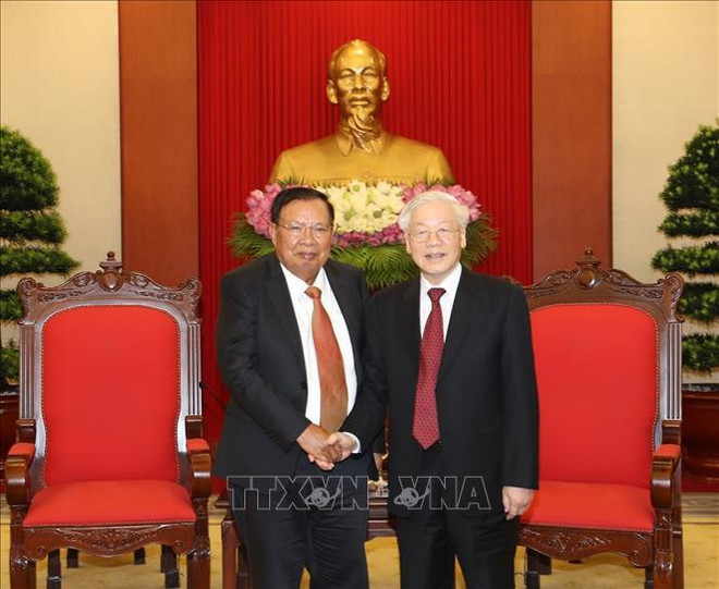 越共中央总书记、国家主席阮富仲会见老挝国家主席本扬·沃拉吉 ảnh 1 越共中央总书记、国家主席阮富仲会见老挝国家主席本扬·沃拉吉 ảnh 1