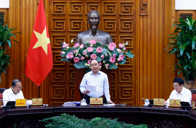 越南政府总理阮春福主持召开越共十三大经济社会小组常委会会议 ảnh 1 越南政府总理阮春福主持召开越共十三大经济社会小组常委会会议 ảnh 1