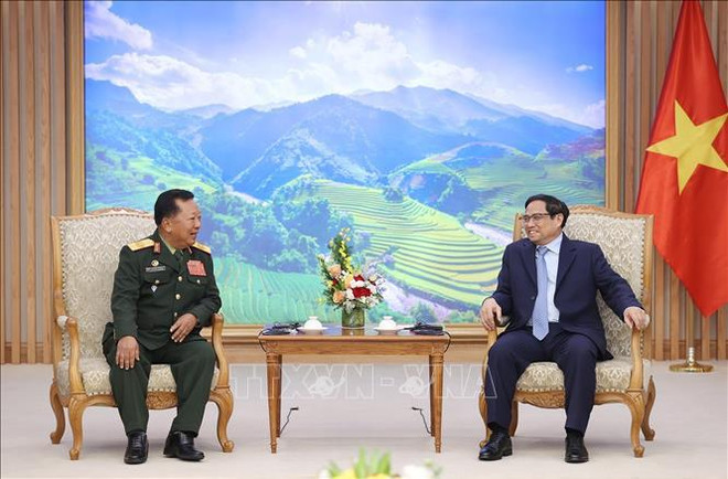 越南领导人会见老挝政府副总理兼国防部长 ảnh 2 越南领导人会见老挝政府副总理兼国防部长 ảnh 2
