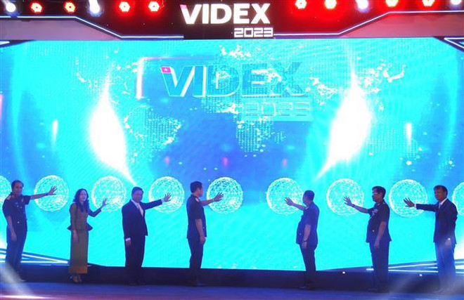 促进越南与柬埔寨防务和经济合作 ảnh 1