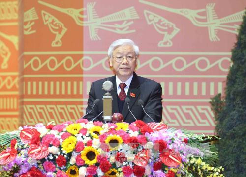 越共十二大在河内隆重开幕 阮富仲同志向大会作报告 ảnh 1