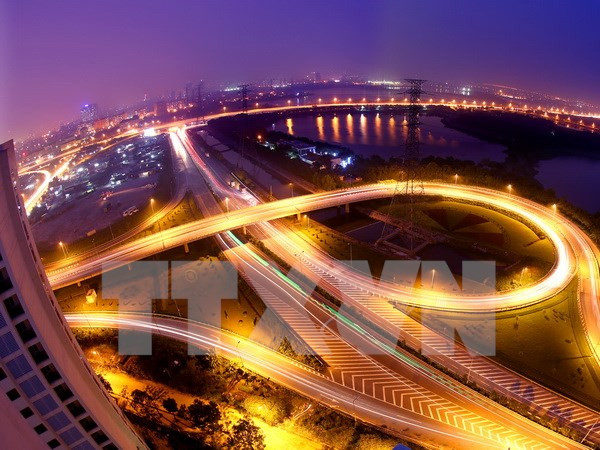 越共十二大：国际舆论高度评价越南经济前景 ảnh 2