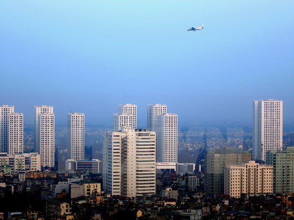 越共十二大：国际舆论高度评价越南经济前景 ảnh 3