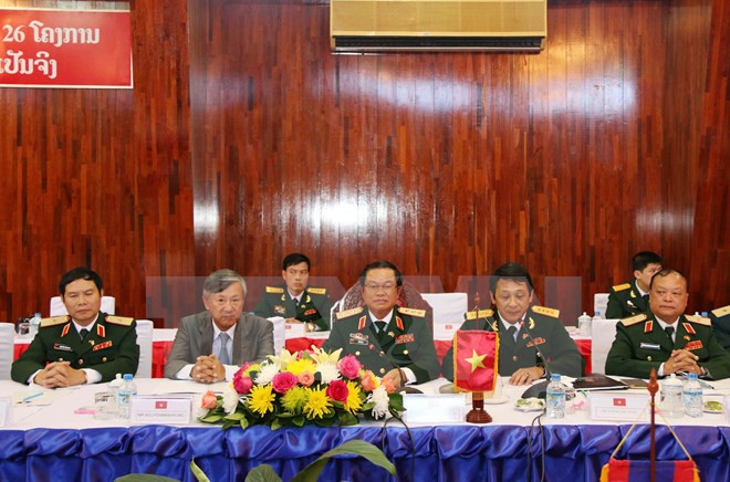 越南人民军高级代表团对老挝进行正式访问 ảnh 1