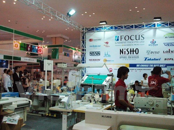 越南参加柬埔寨纺织工业机械展览会 ảnh 1