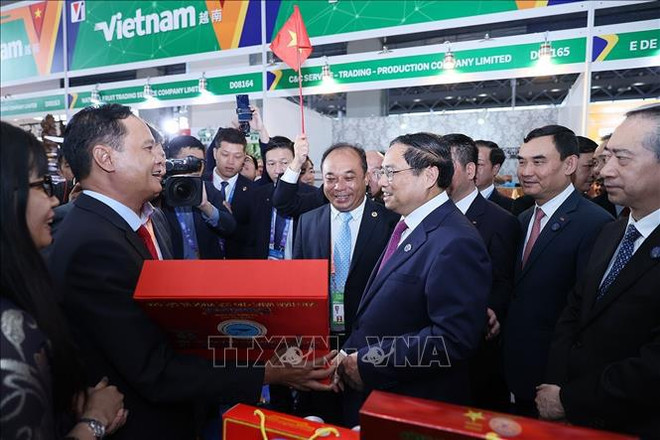 越南政府总理范明政:希望越南成为东盟与中国货物中转站 ảnh 1 越南政府总理范明政:希望越南成为东盟与中国货物中转站 ảnh 1