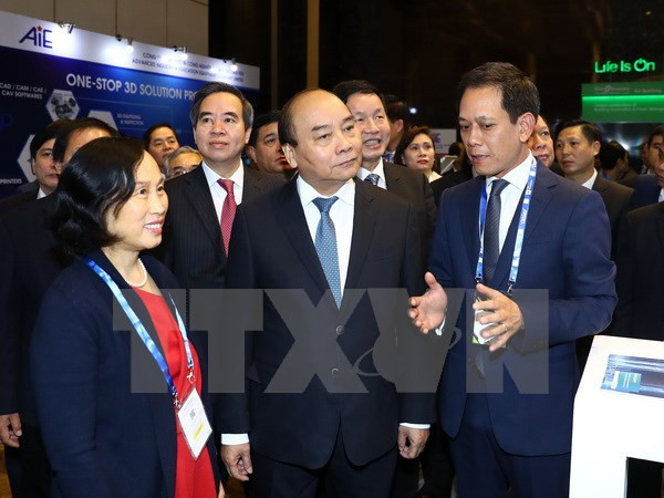 政府总理阮春福:第四次工业革命是实现民族繁荣昌盛渴望的机会 ảnh 1 政府总理阮春福:第四次工业革命是实现民族繁荣昌盛渴望的机会 ảnh 1