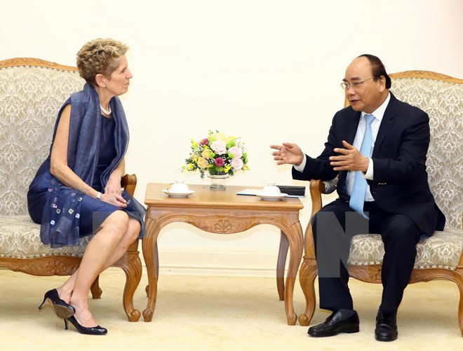 加拿大安大略省省长支持推进贸易自由化 ảnh 2 加拿大安大略省省长支持推进贸易自由化 ảnh 2