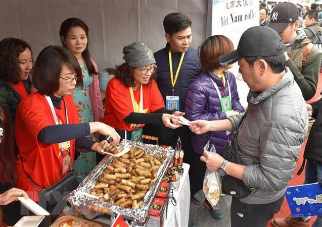 越南参加在中国举行的国际义卖活动 ảnh 3 越南参加在中国举行的国际义卖活动 ảnh 3