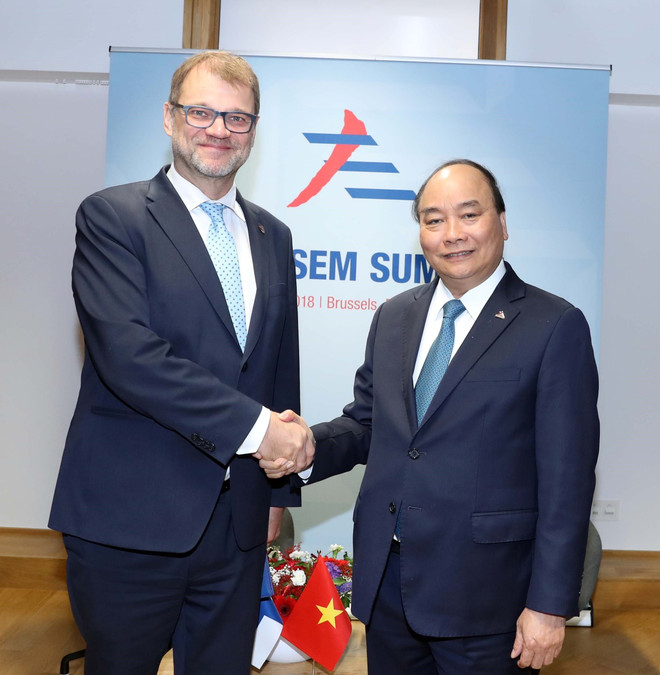 政府总理阮春福出席第十二届亚欧首脑会议期间举行多场双边会晤 ảnh 4 政府总理阮春福出席第十二届亚欧首脑会议期间举行多场双边会晤 ảnh 4