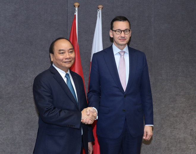 政府总理阮春福出席第十二届亚欧首脑会议期间举行多场双边会晤 ảnh 3 政府总理阮春福出席第十二届亚欧首脑会议期间举行多场双边会晤 ảnh 3