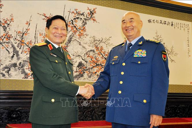 吴春历会见中共中央政治局委员、中央军委副主席许其亮 ảnh 1