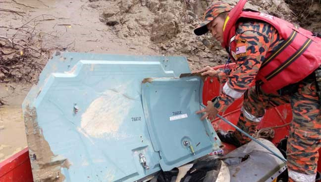 马来西亚直升机失联事件：已找到残骸与一具妇女尸体 ảnh 1