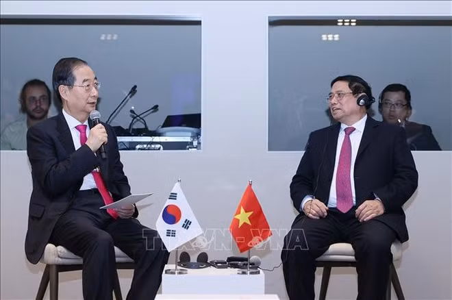 世界经济论坛第54届年会：政府总理范明政会见各国和国际组织领导 ảnh 2
