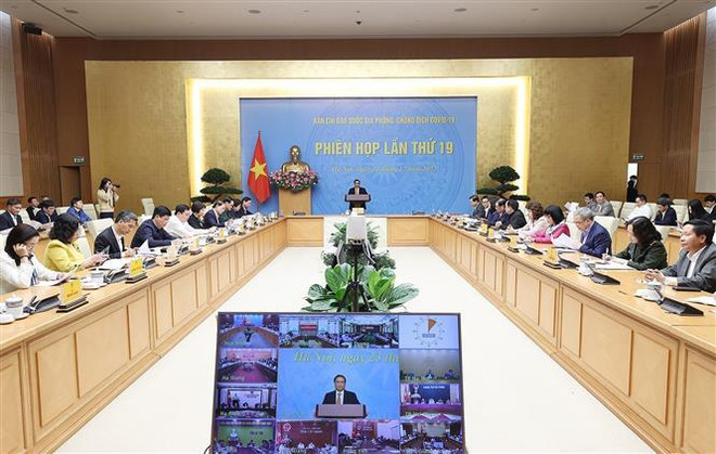 越南政府总理范明政主持召开国家新冠肺炎疫情防控指导委员会第19次会议 ảnh 2 越南政府总理范明政主持召开国家新冠肺炎疫情防控指导委员会第19次会议 ảnh 2