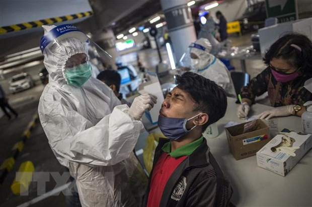 印度尼西亚考虑尽快取消防控新冠肺炎疫情所有限制措施 ảnh 1 印度尼西亚考虑尽快取消防控新冠肺炎疫情所有限制措施 ảnh 1