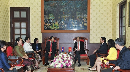 越南《人民报》社与老挝《人民报》社加强合作 ảnh 1 越南《人民报》社与老挝《人民报》社加强合作 ảnh 1