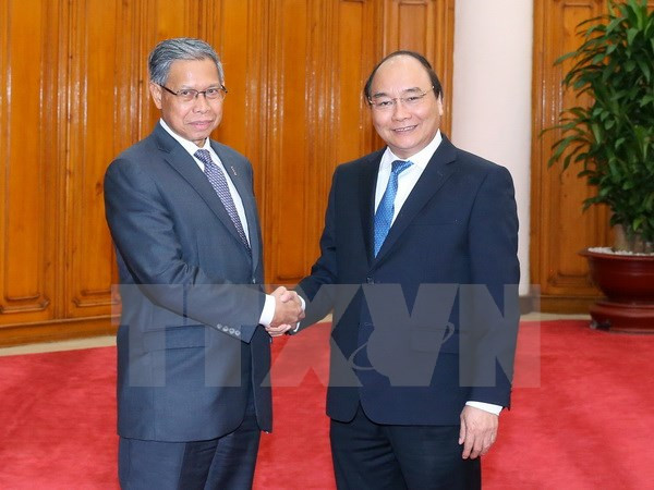 越南政府总理阮春福会见马来西亚国际贸易和工业部长 ảnh 1