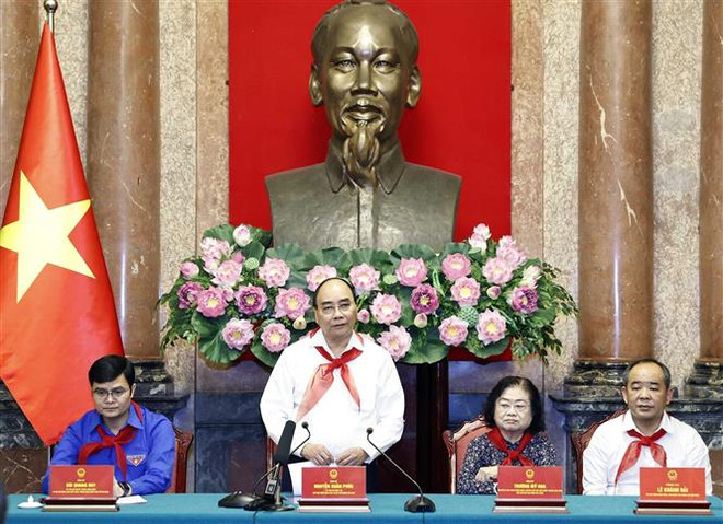 越南国家主席阮春福会见全国各民族优秀少年儿童代表 ảnh 2 越南国家主席阮春福会见全国各民族优秀少年儿童代表 ảnh 2