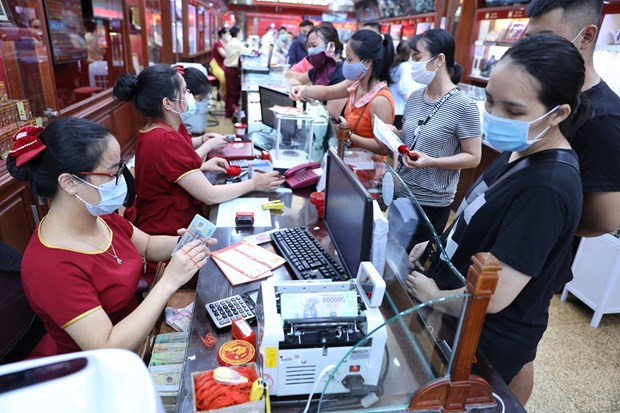 3月18日上午越南国内黄金价格上涨30万越盾 ảnh 1