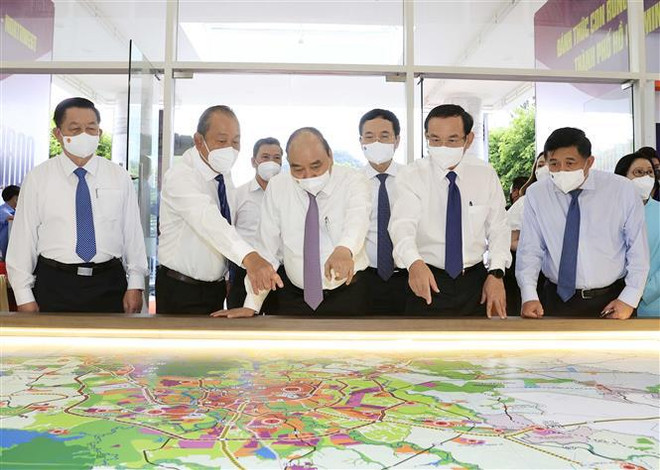 国家主席阮春福:发展赫门与古芝两县 解决胡志明市发展空间扩大问题 ảnh 1 国家主席阮春福:发展赫门与古芝两县 解决胡志明市发展空间扩大问题 ảnh 1