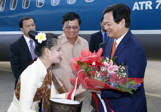 越南政府总理阮晋勇会见老挝越南投资商 ảnh 1 越南政府总理阮晋勇会见老挝越南投资商 ảnh 1