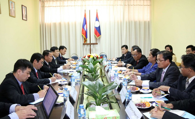 越南通讯社同老挝通讯社加强合作 携手前进 ảnh 2 越南通讯社同老挝通讯社加强合作 携手前进 ảnh 2