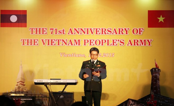 越南人民军建军71周年纪念典礼在老挝举行 ảnh 1 越南人民军建军71周年纪念典礼在老挝举行 ảnh 1
