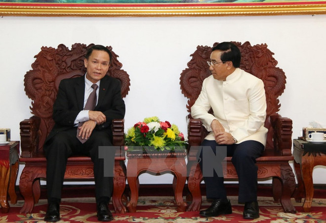 越南通讯社同老挝通讯社加强合作 携手前进 ảnh 3 越南通讯社同老挝通讯社加强合作 携手前进 ảnh 3