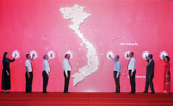 越南国家主席阮春福:爱心志愿活动是全社会的共同责任 ảnh 1 越南国家主席阮春福:爱心志愿活动是全社会的共同责任 ảnh 1