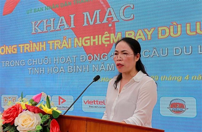 滑翔伞飞行活动——和平省旅游需求刺激活动之一 ảnh 2 滑翔伞飞行活动——和平省旅游需求刺激活动之一 ảnh 2